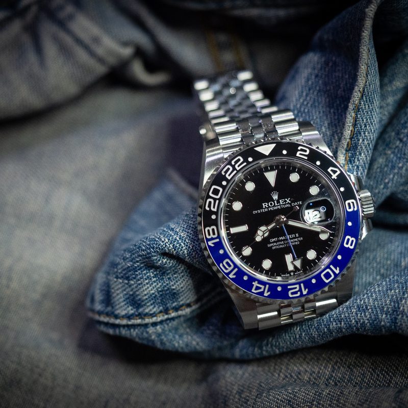 Rolex GMT Master 2 Blueblack(Batman) 126710BLNR. on jeans jacket background