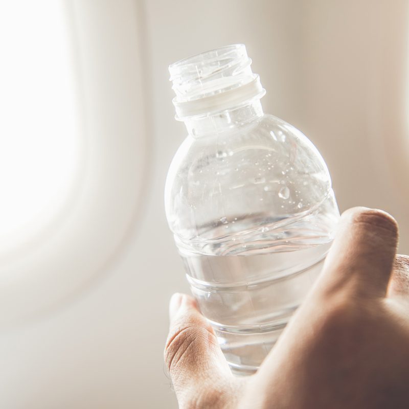 Drinking water on the plane