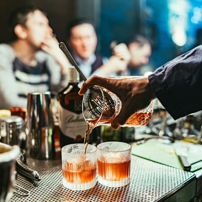 Bartender making cocktails