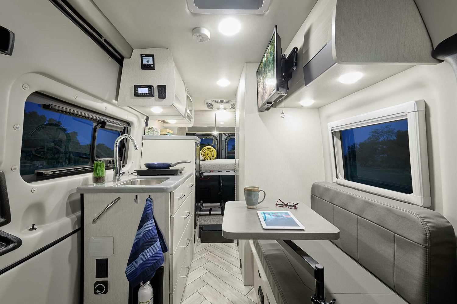 Sleek, luxurious interior of Thor Motor Coach's Sanctuary camper van.