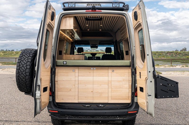 Looking into the rear doors of Vanspeed's California Coast camper van build.