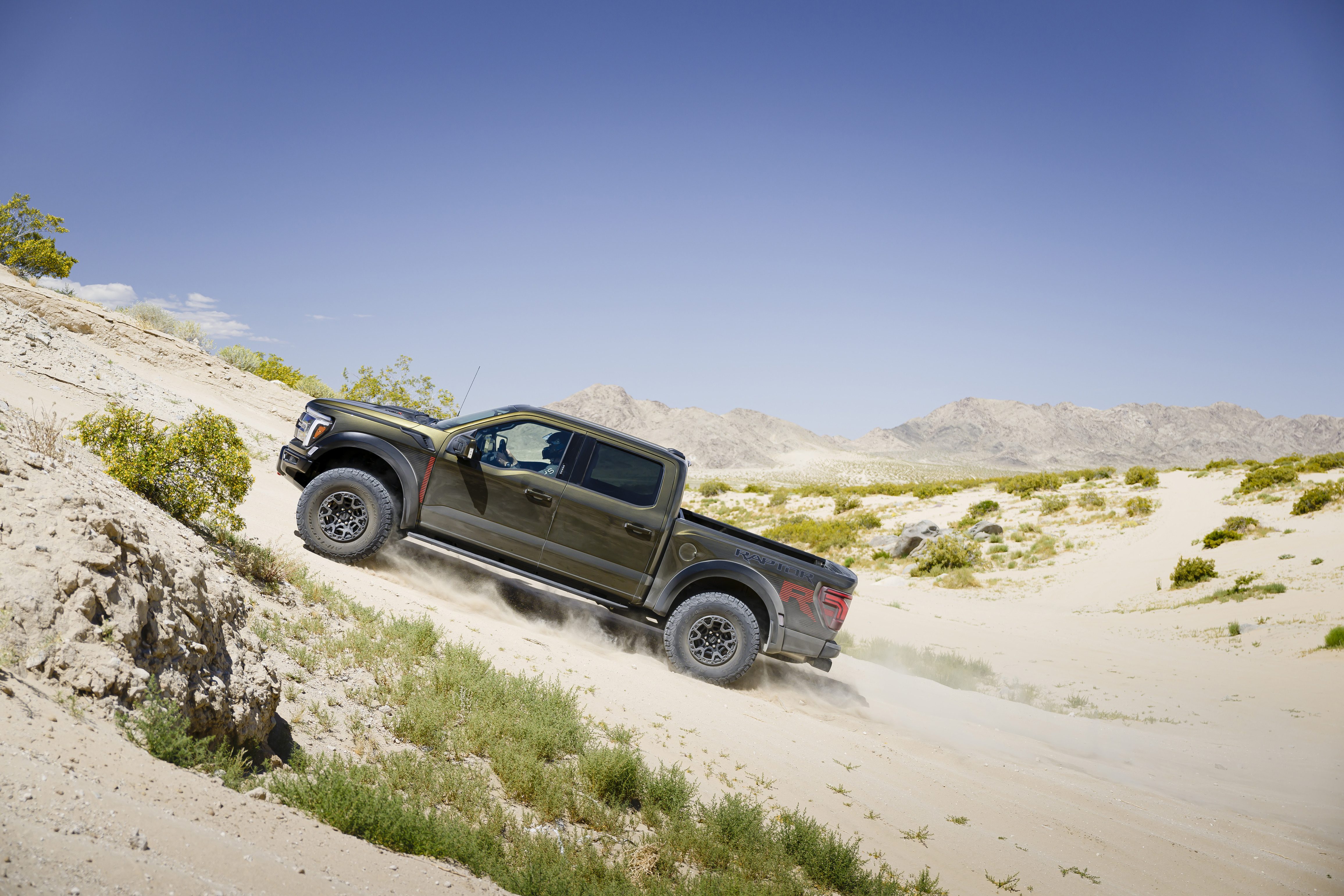 2024 Ford F-150 Raptor R climbing a dune