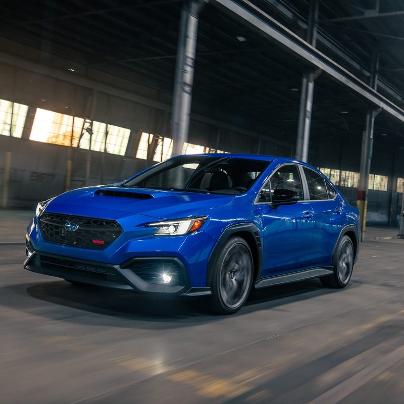 2025 Subaru WRX TS left front three-quarter view inside a warehouse.