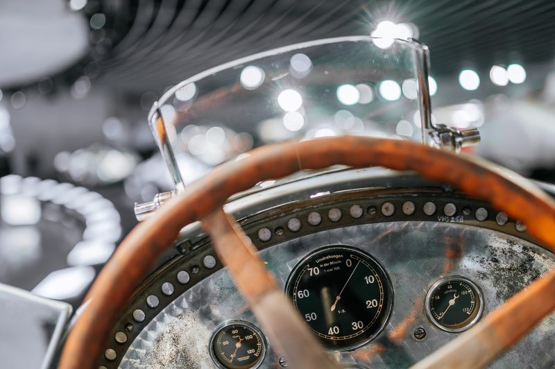Behind the wheel of the Mercedes-Benz Silver Arrow W25 single-seat race car at the Mercedes-Benz Museum.