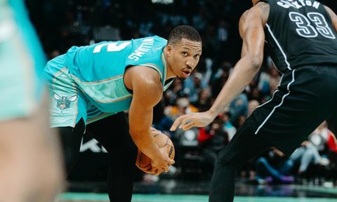 Grant Williams playing basketball