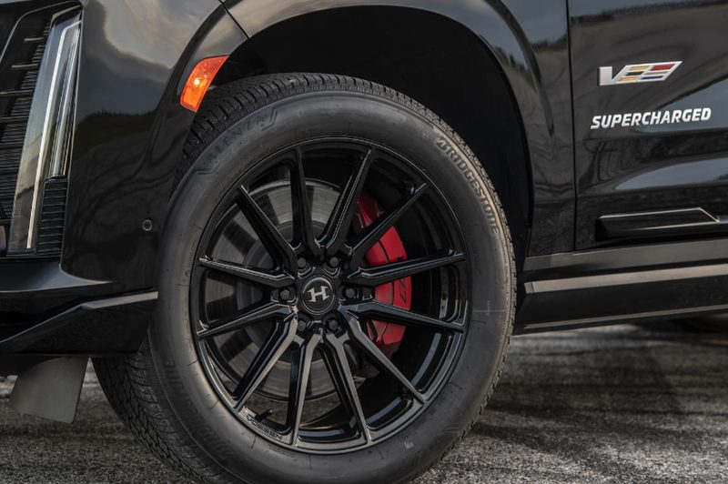 Hennessey H850 Cadillac-V conversion driver side front wheel and door with badges.