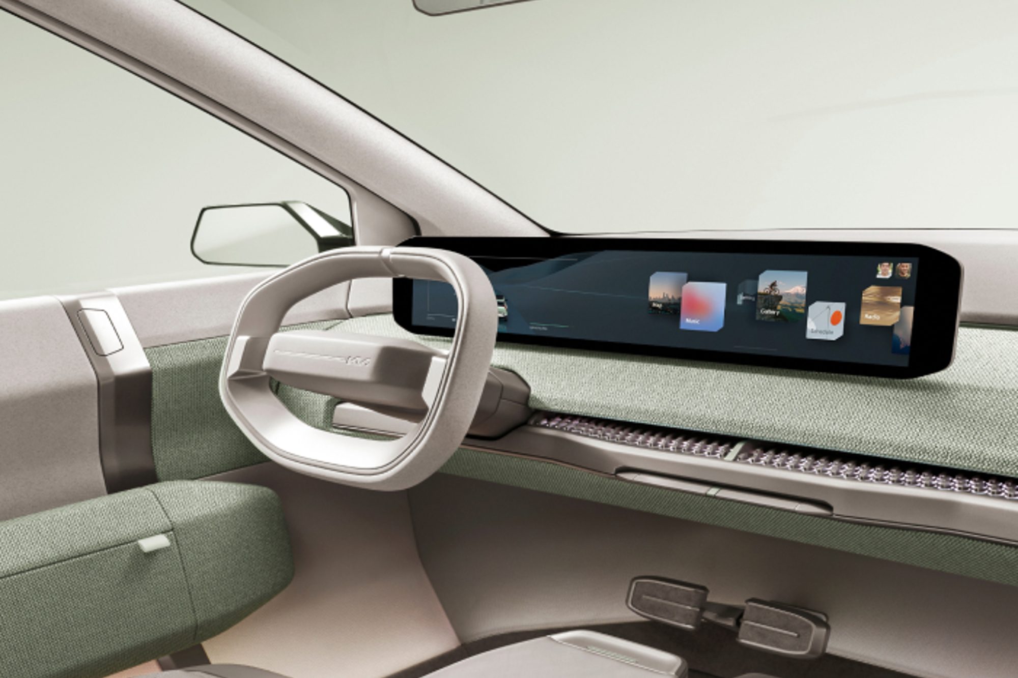 Kia EV3 Concept car view of the 30-inch dashboard display and the driver seat.