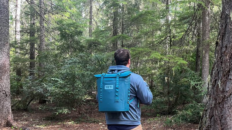 Author carrying the Yeti Hopper M12 Backpack Soft Cooler.
