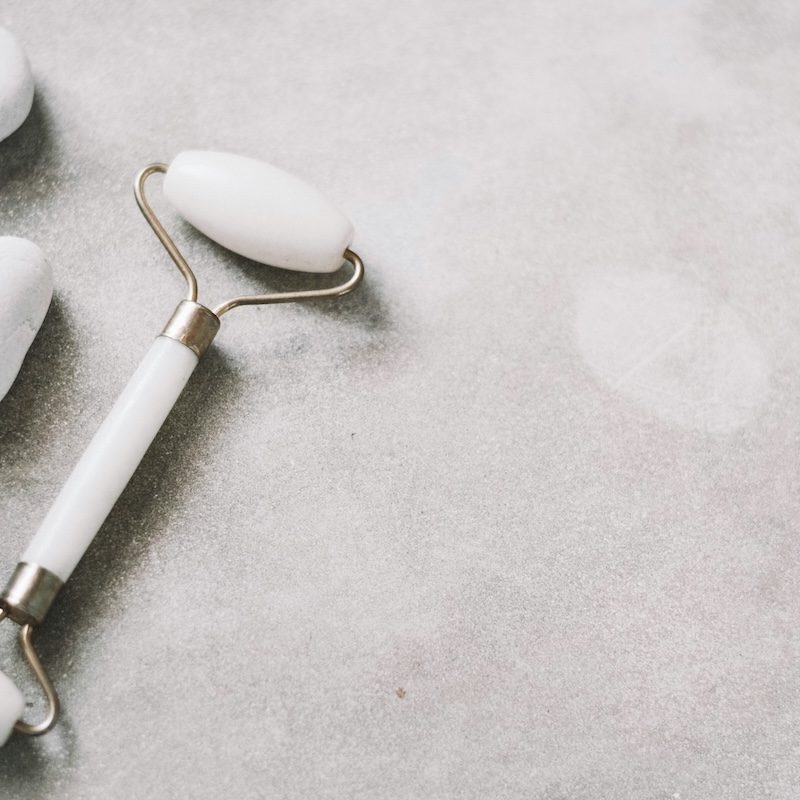 Skincare products on stone