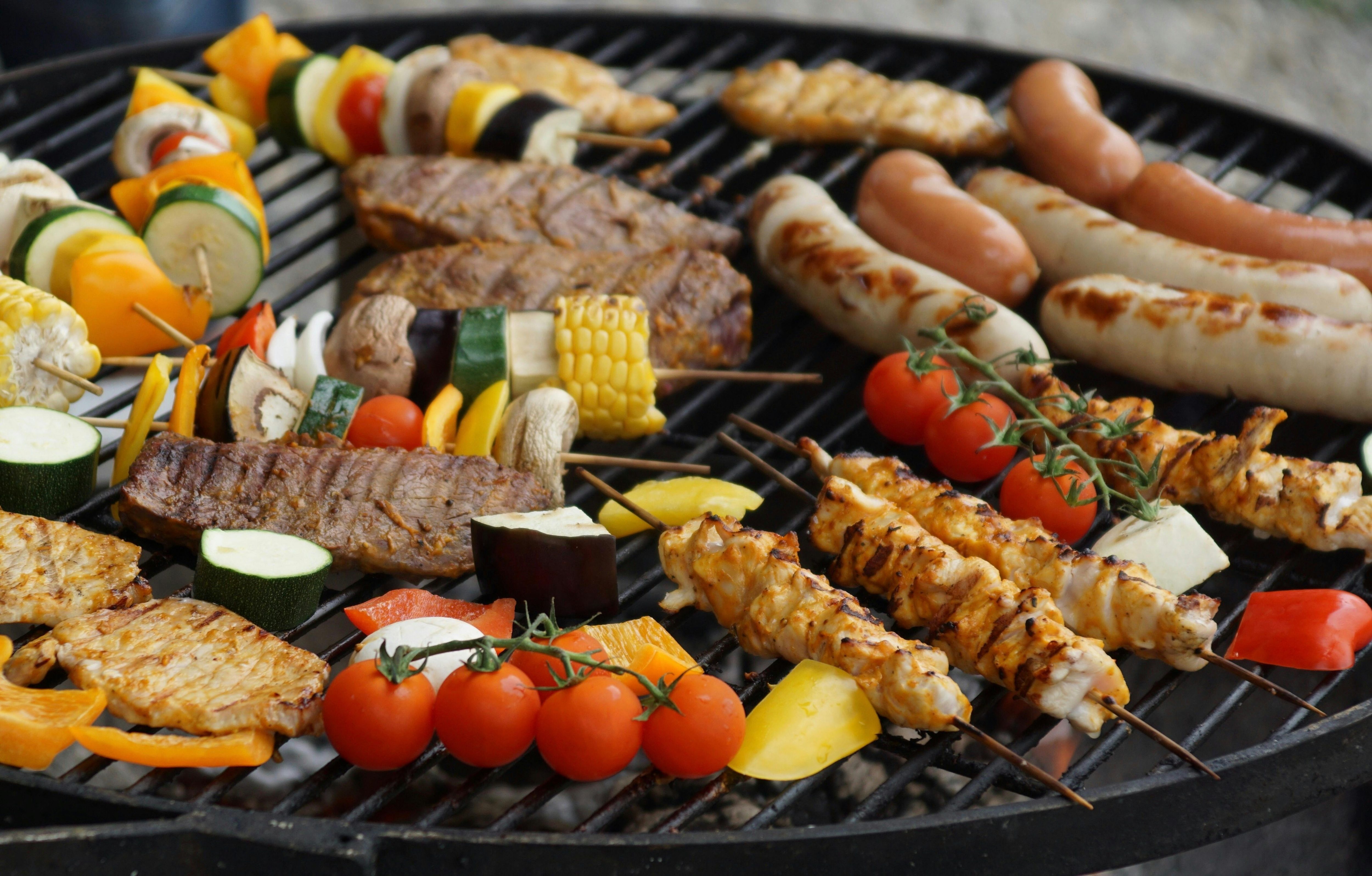 Steak and vegetables on grill