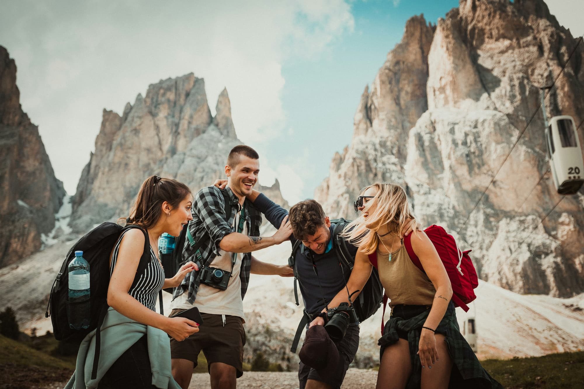 group of friends laughing together outside