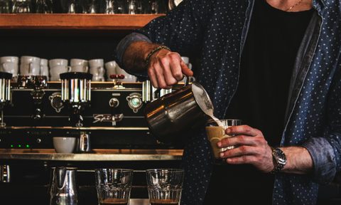 Barista preparing drink