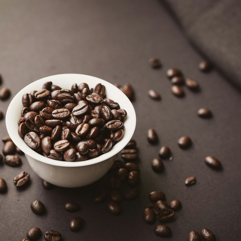 Coffee beans in white bowl