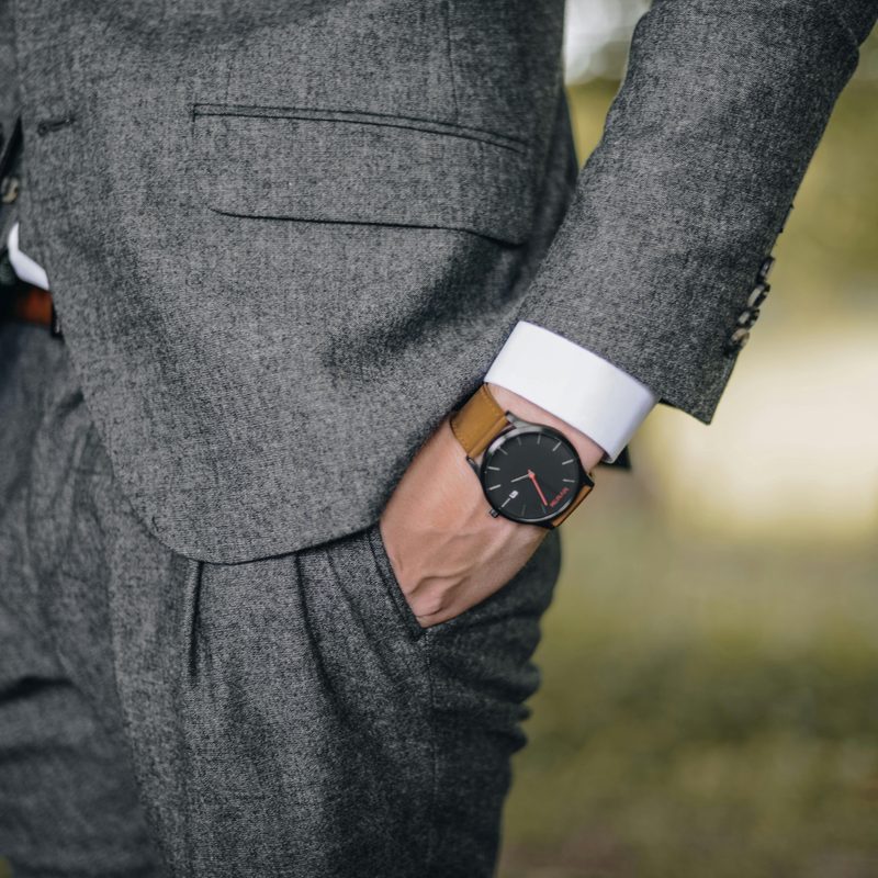 Man in suit wearing a watch