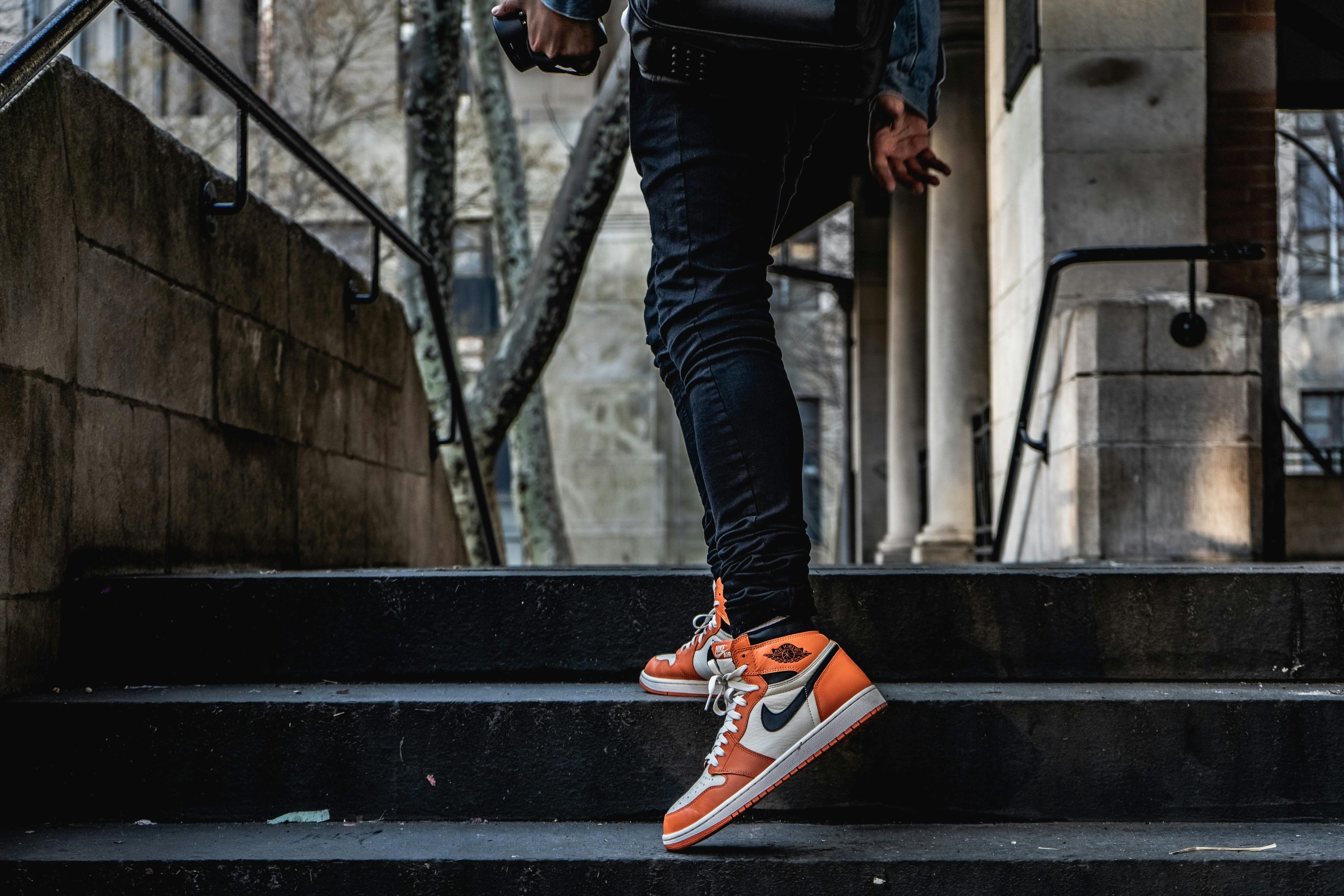 man on steps in nikes