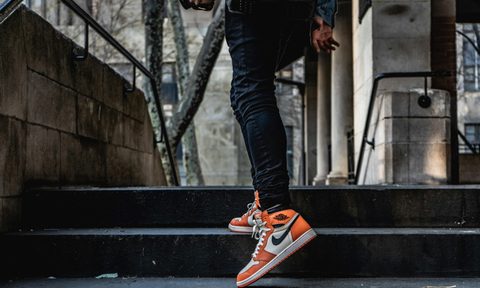 man on steps in nikes
