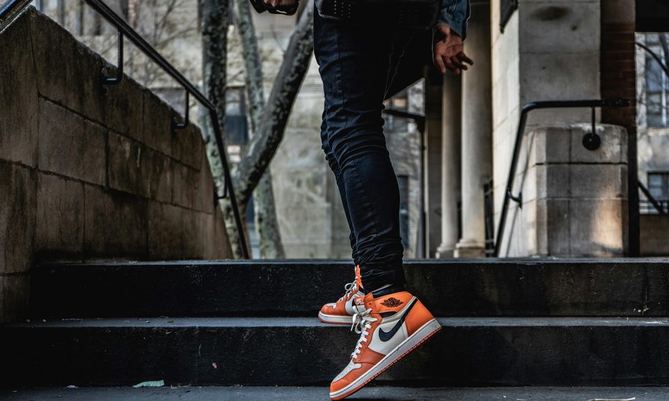 man on steps in nikes