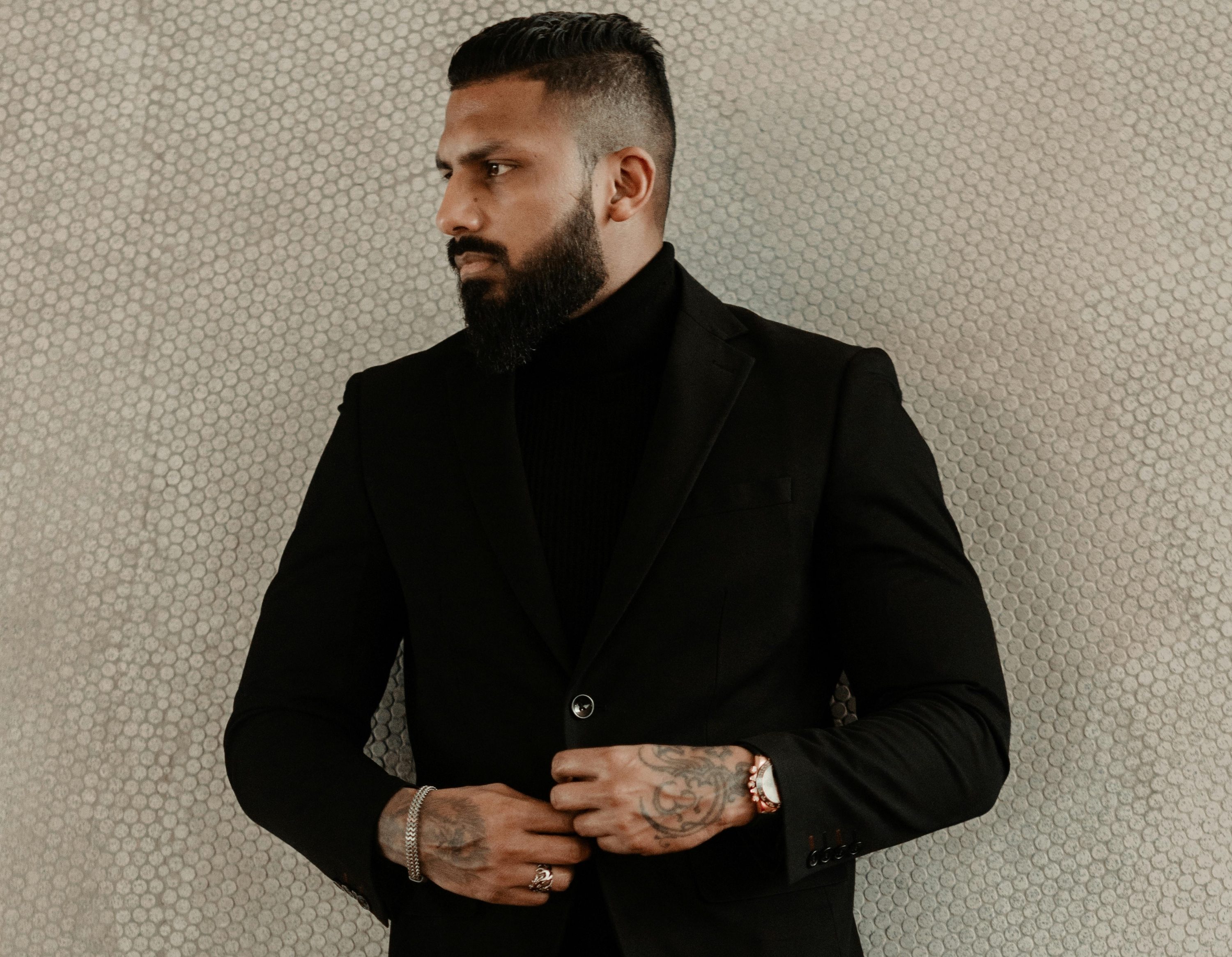 man with beard in suit