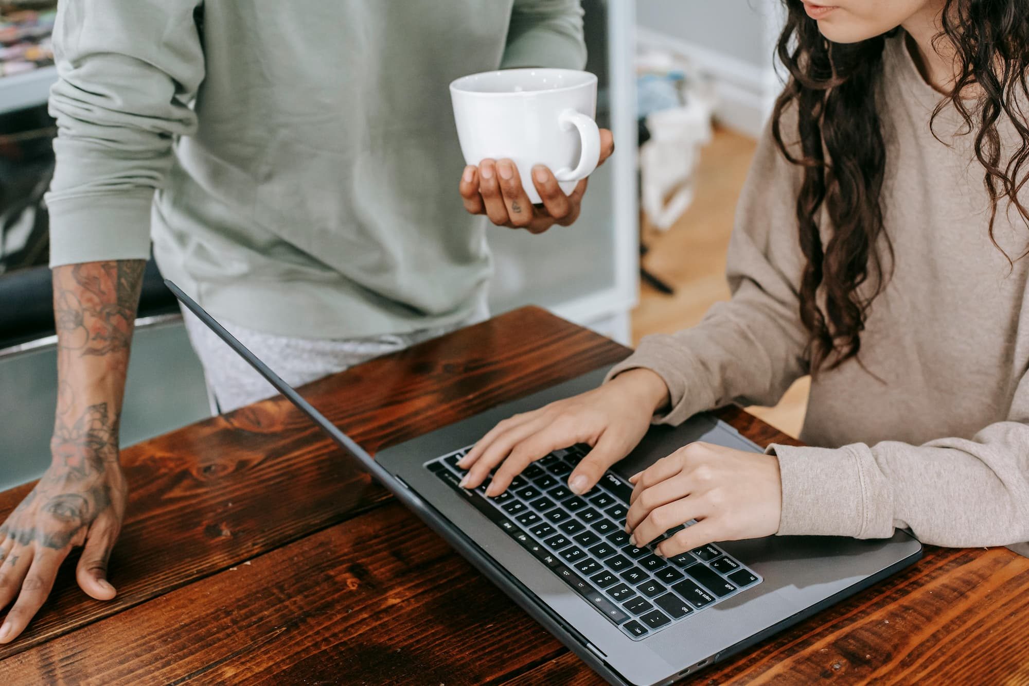 man and woman on computer