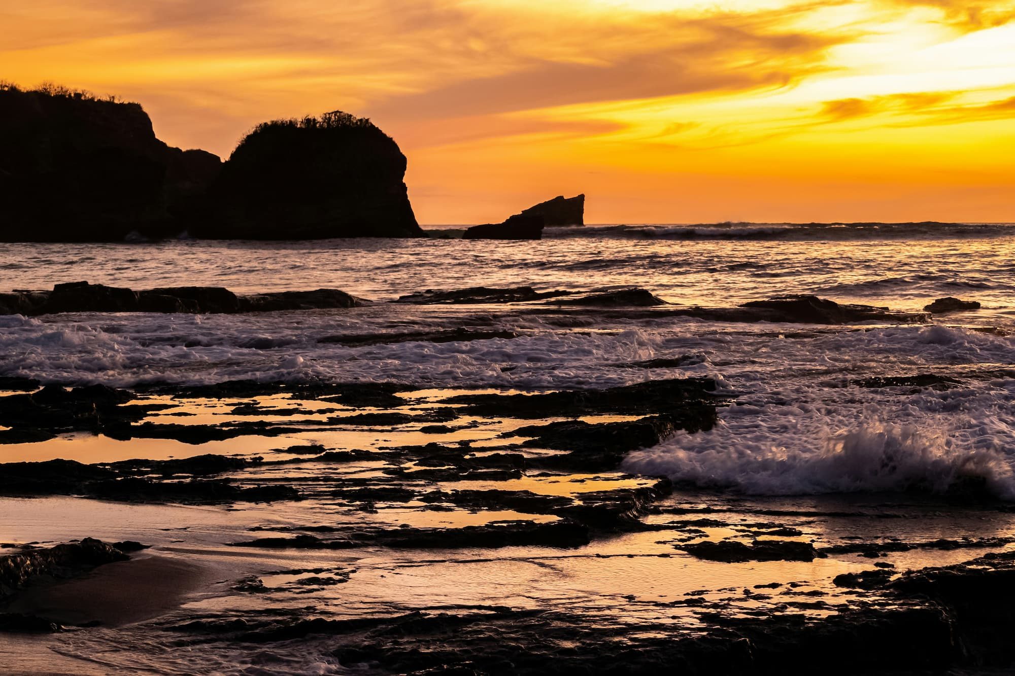 a sunset over the ocean