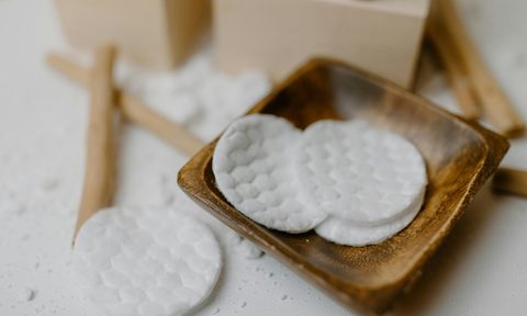 Facial cloths on a wooden ring dish