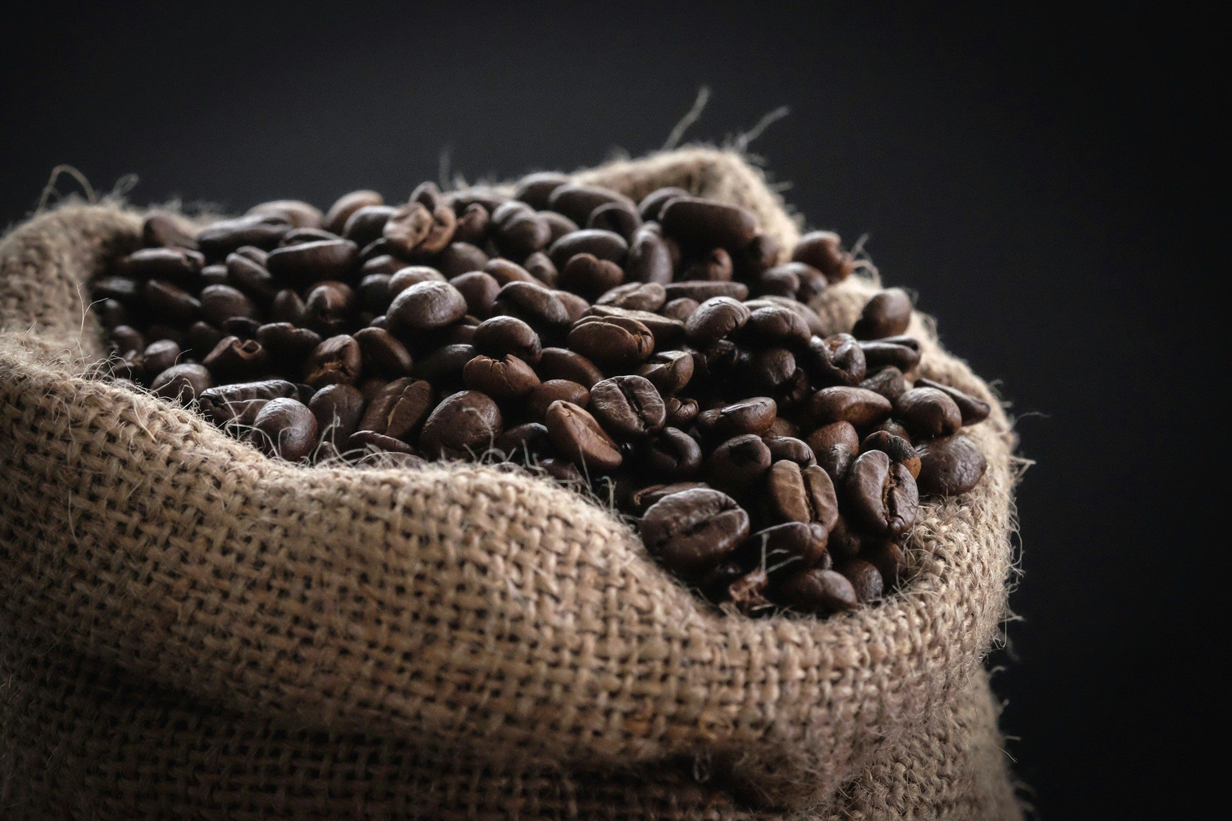 Coffee beans in burlap sack