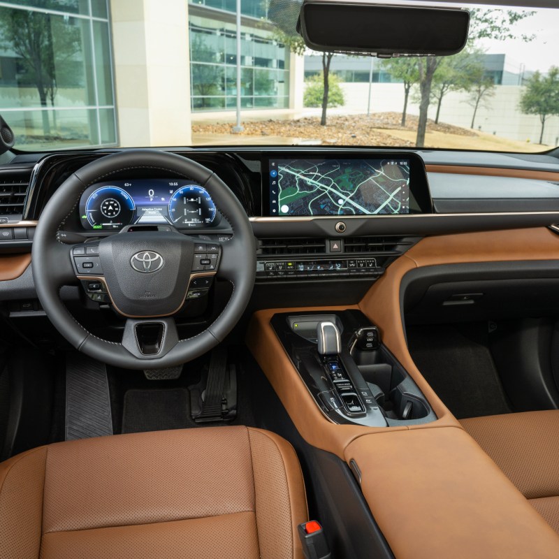 2025 Toyota Crown Signia Limited interior image showing the front seats, driver cockpit, and full dashboard with displays and controls.