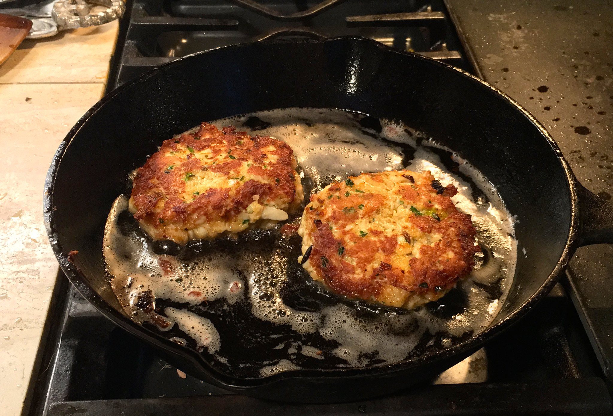Crab cakes in pan