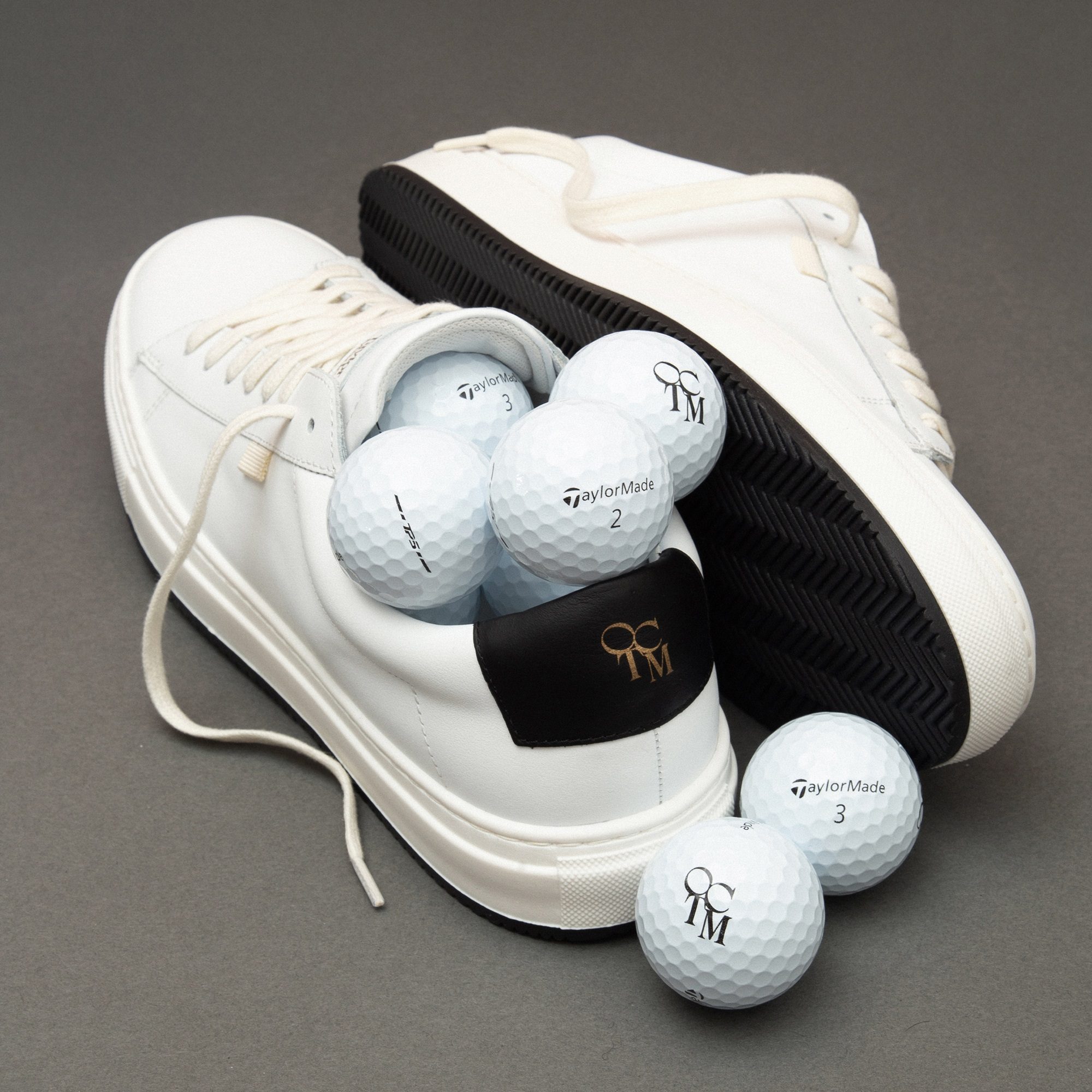 Oliver Cabell for TaylorMade sneakers with golf balls