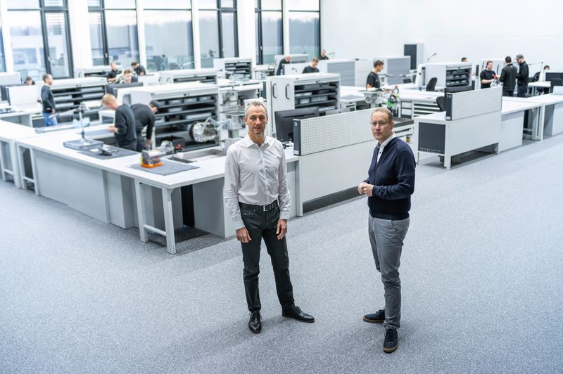 Audi Formula Racing GmbH CEO Adam Baker and CTO Stefan Dreyer in a combustion engine workshop for the Audi Power Unit for F1.