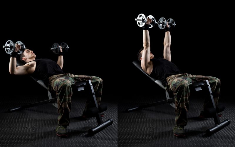 Man doing incline dumbbell press.