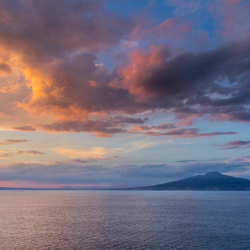 Sunset view of distant Mount Vesuvius