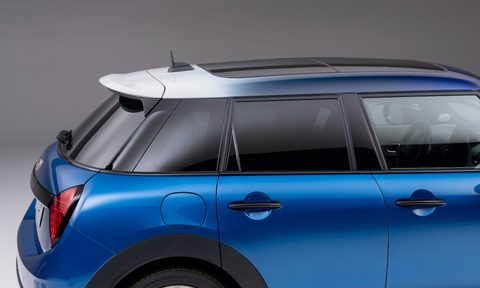 2024 Mini Cooper S 4-door right side doors and rear quarter panel with sunroof and slight wing.