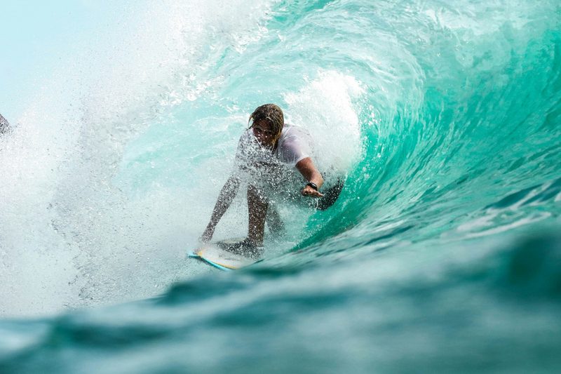 Surfer riding a tube in Bali