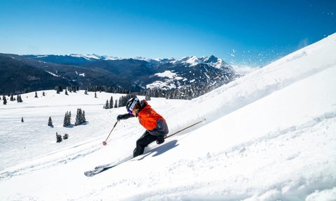 Skier in powder at Vail Colorado