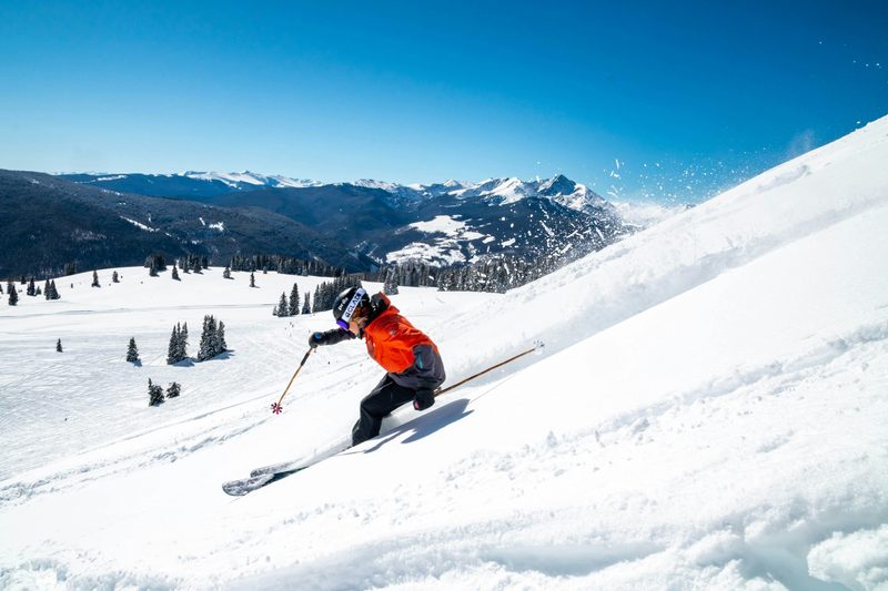 Skier in powder at Vail Colorado
