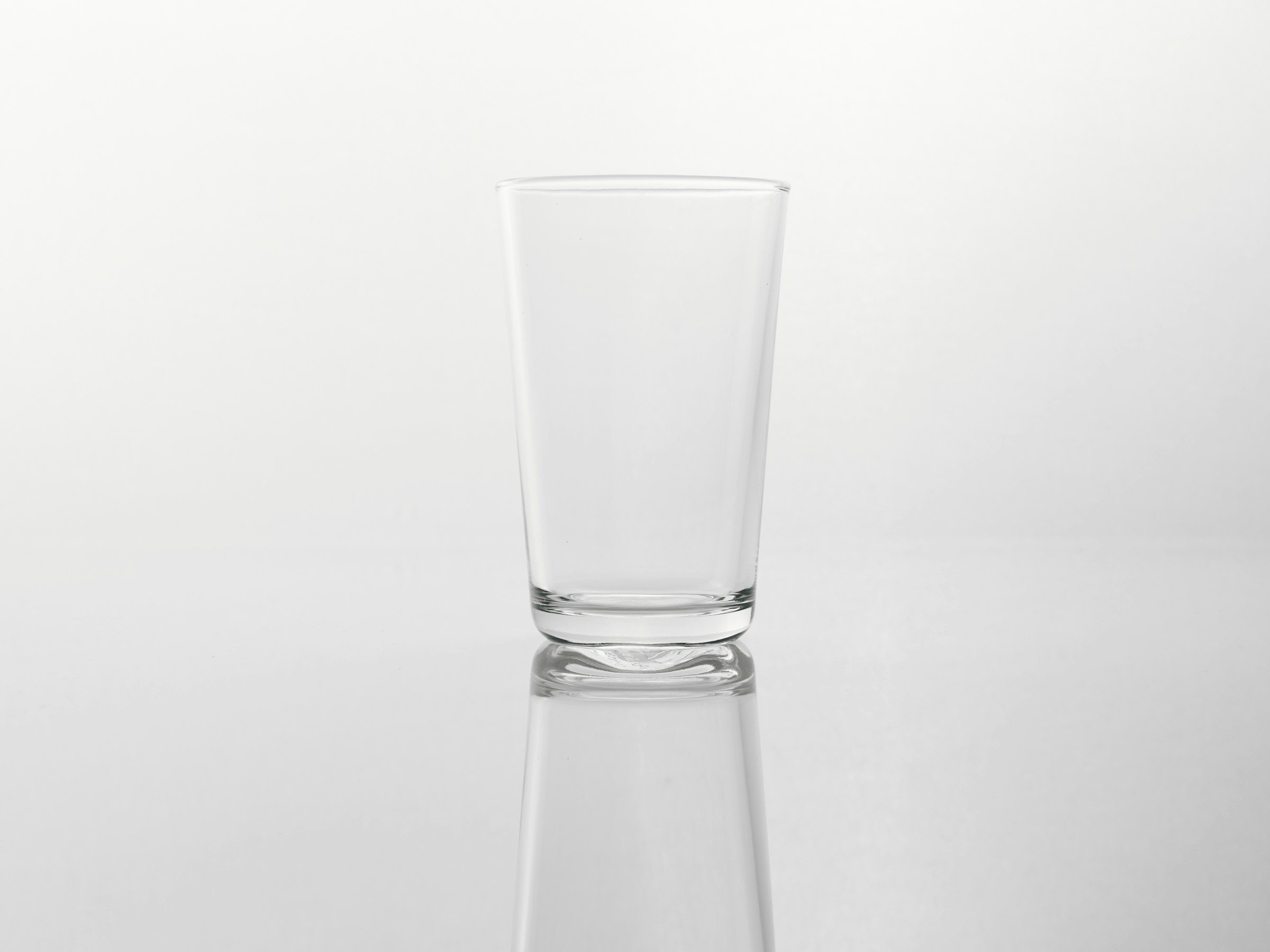 Empty glass with grey background