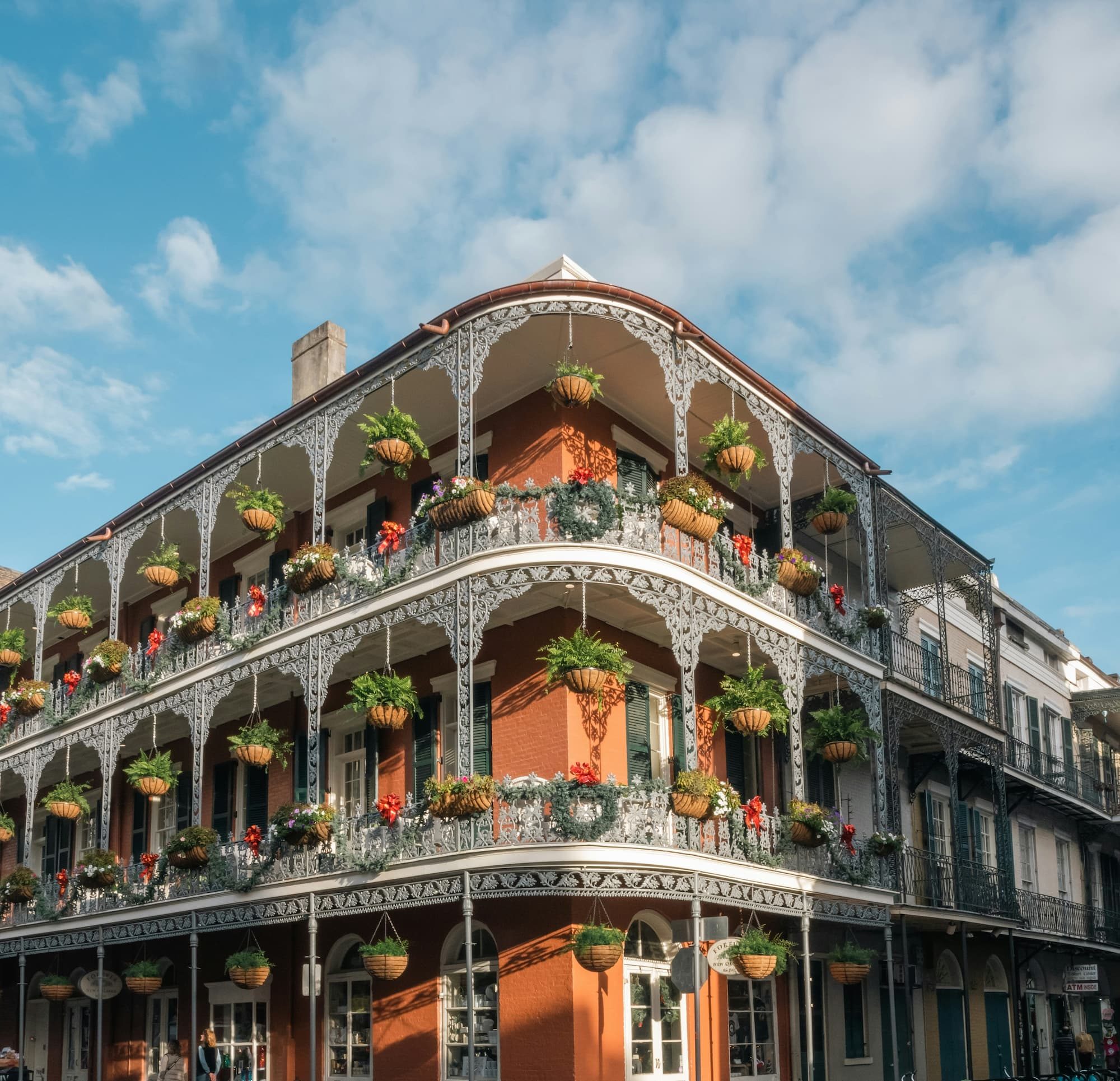 tall orange building with while balcony