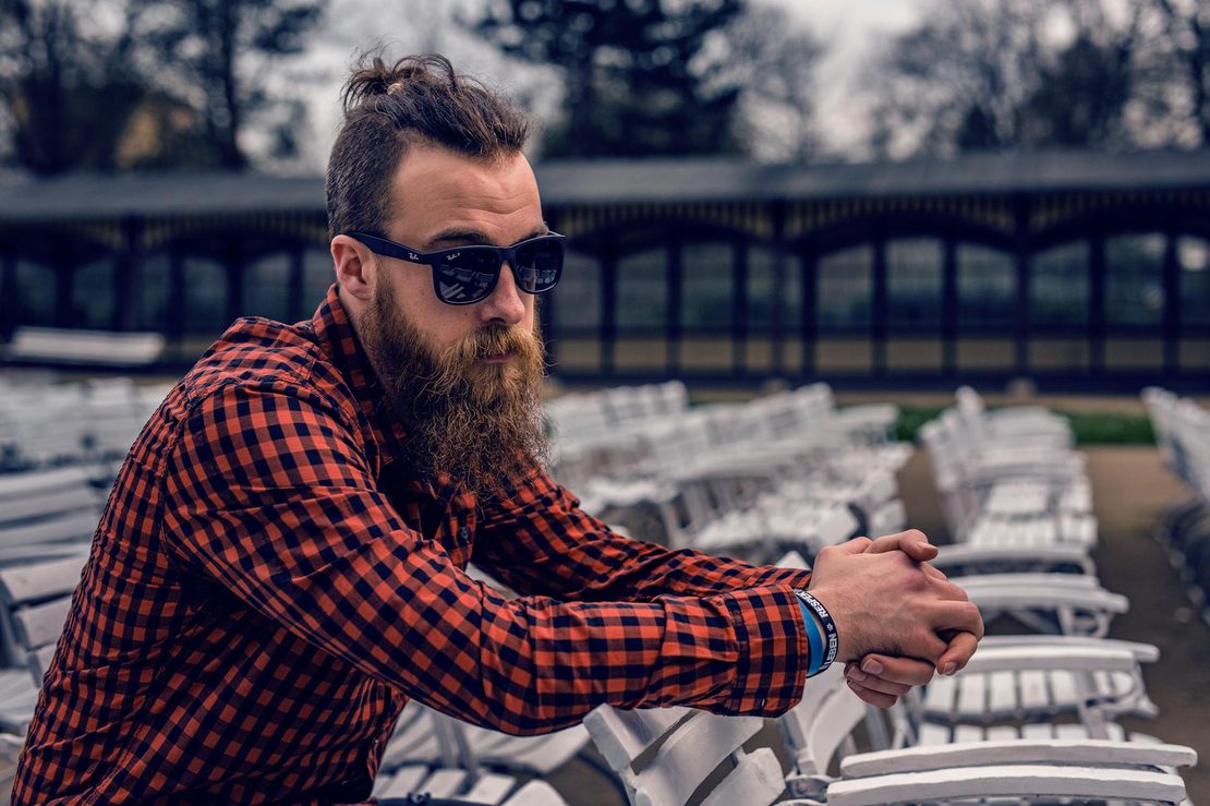 man wearing black wayfarer sunglasses