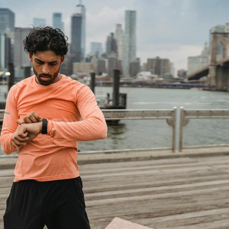 Man timing his workout.
