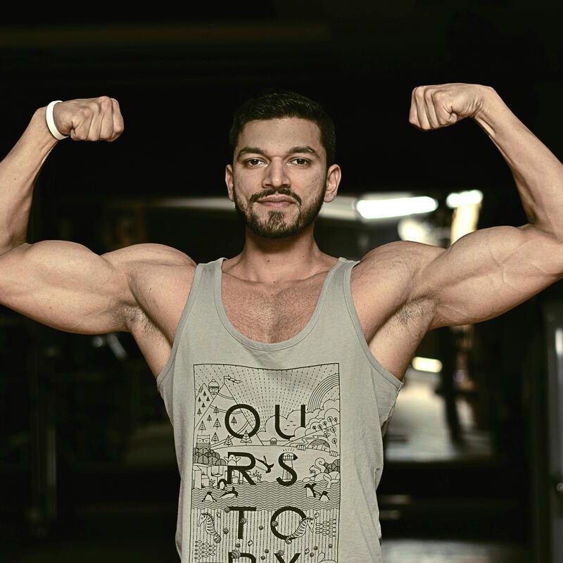 Man flexing biceps.