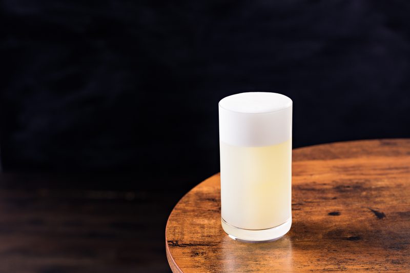 Refreshing Gin Fizz Cocktail on a Table