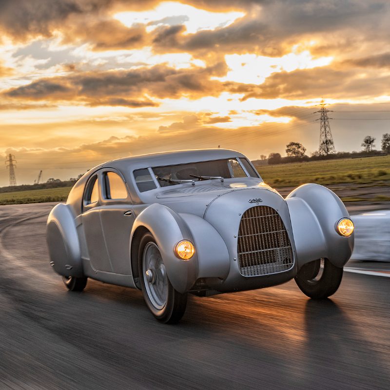 2023 Audi Schnellsportwagen image driving on a curved road.