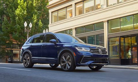 2024 vw tiguan wolfsburg edition in atlantic blue on a city street