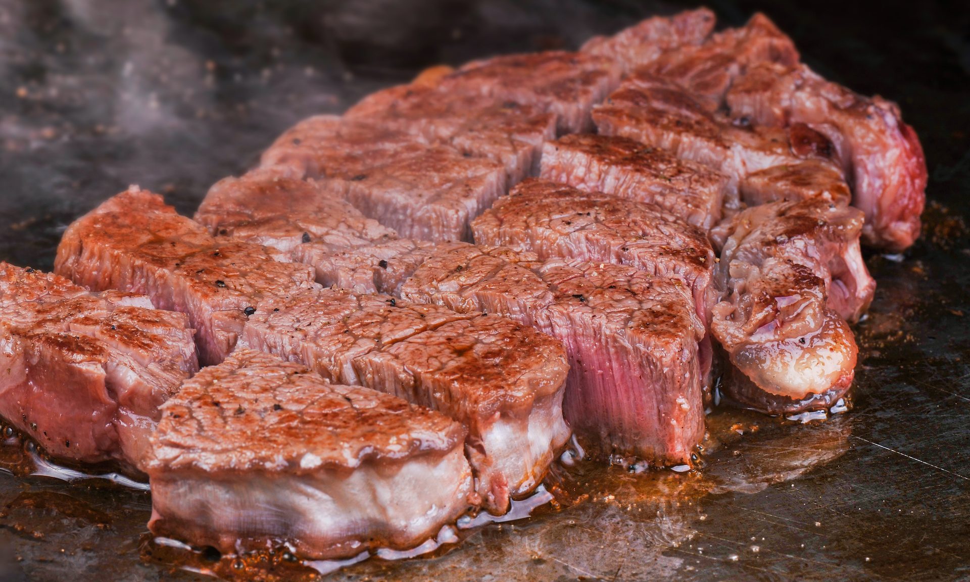 Sliced steak cooking