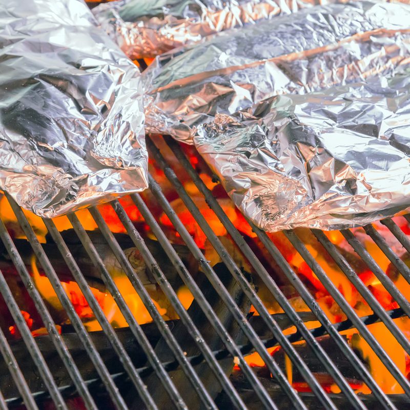 Foil packets on a grill
