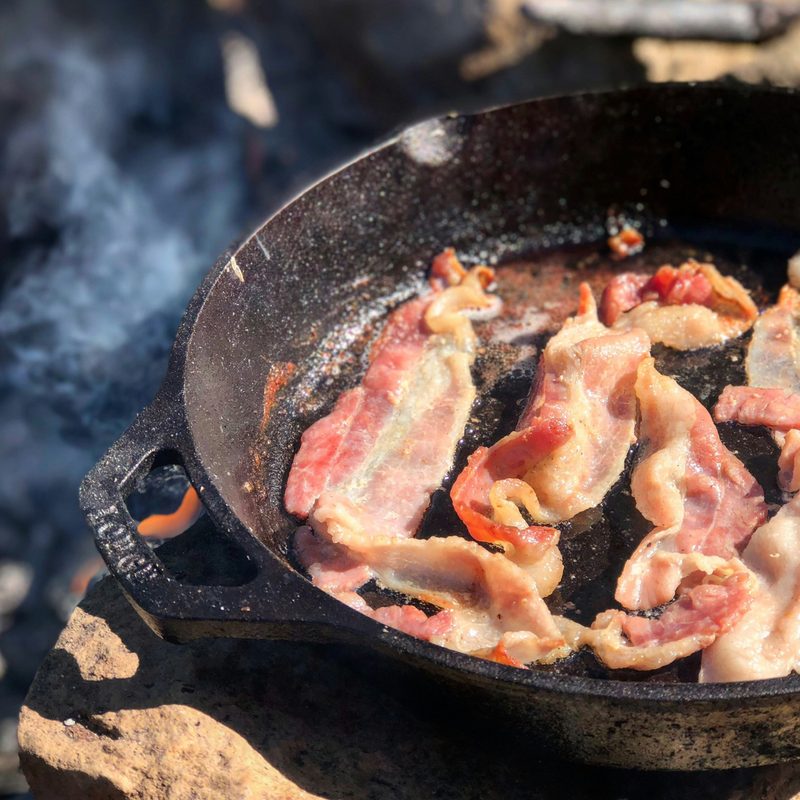 Bacon cooking a cast iron pan