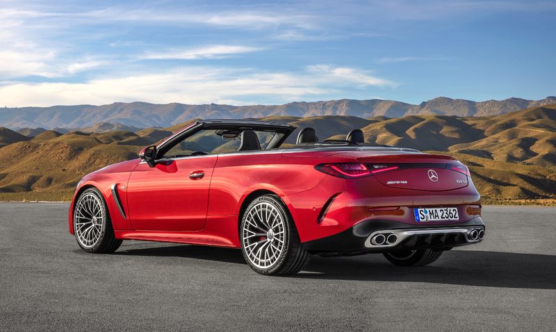Mercedes-AMG CLE 53 4MATIC+ Cabriolet left rear three-quarter view parked with mountains in the background.