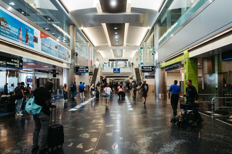 People in Miami Airport terminal