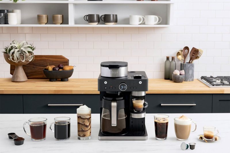 The Ninja Espresso & Coffee Barista System on a kitchen counter top.